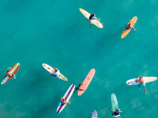 surfing with Friends or Co-workers in Playa Caracol